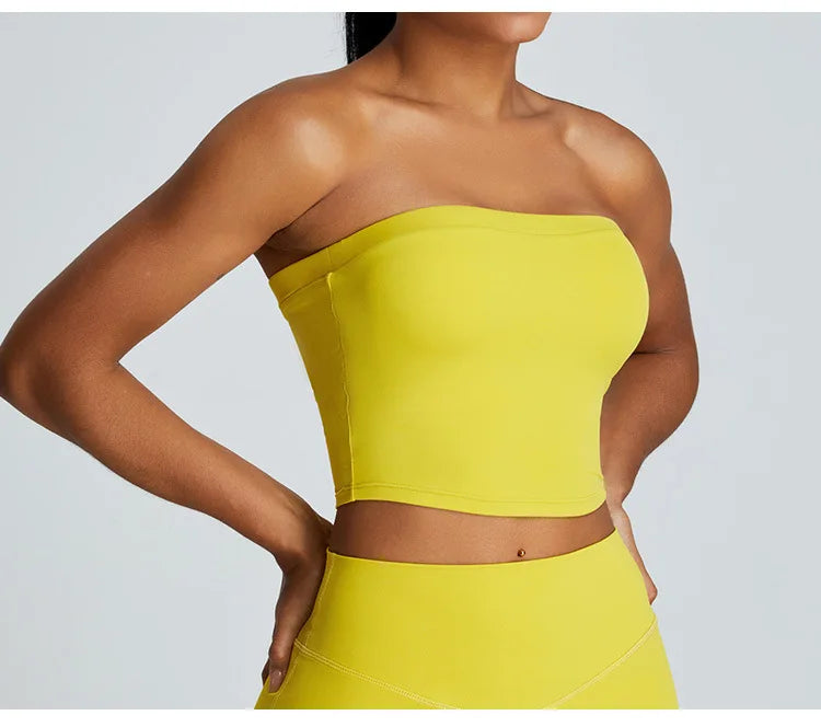 Stylish yellow strapless activewear set featuring a fitted crop top for comfort and movement
