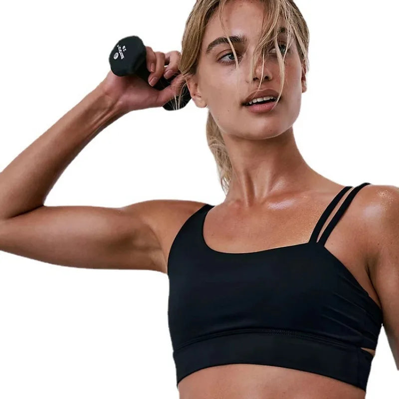 Black sports bra with wide band and adjustable shoulder straps