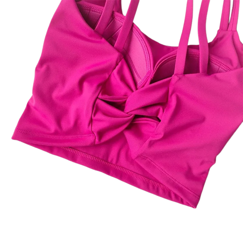 Xooie Fit stylish fitness bra in vibrant pink with a trendy twisted front design