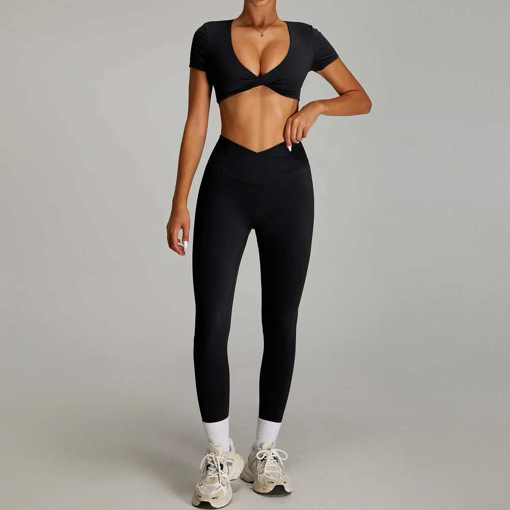 Xooie Fit twist crop top and leggings outfit in black, perfect for activewear and stylish workouts.