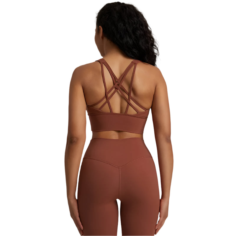 Xooie Fit unique back design sports bra in brown, featuring stylish crisscross straps for comfort and support