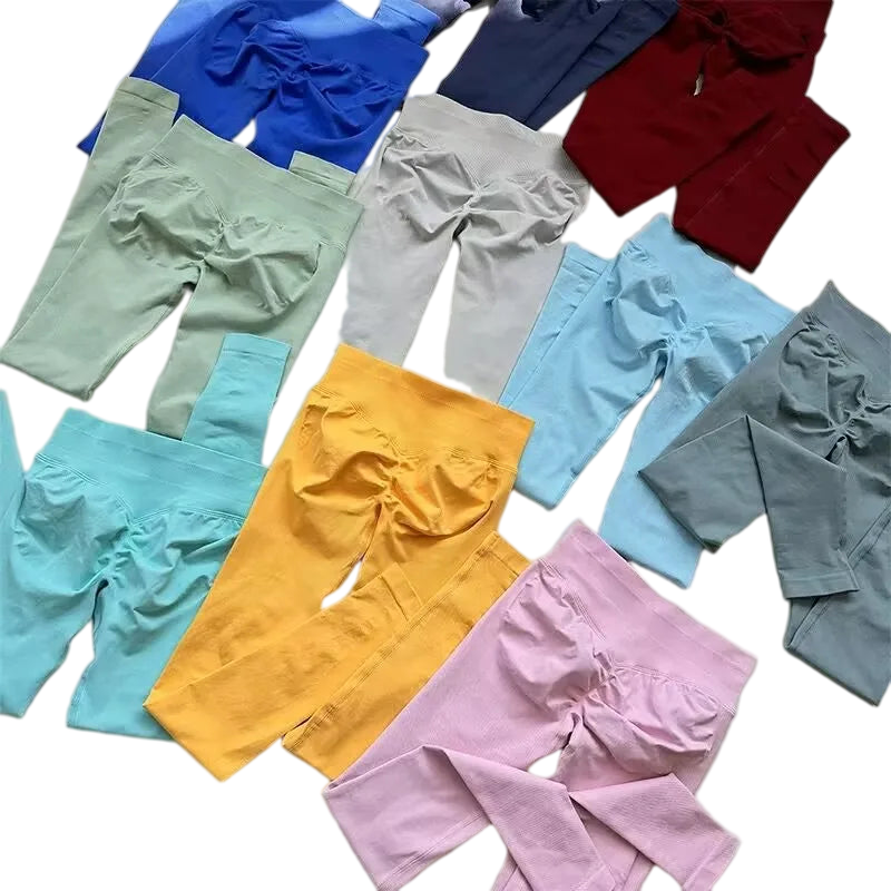 Colorful Xooie Fit women's active leggings in various shades arranged stylishly for fitness enthusiasts