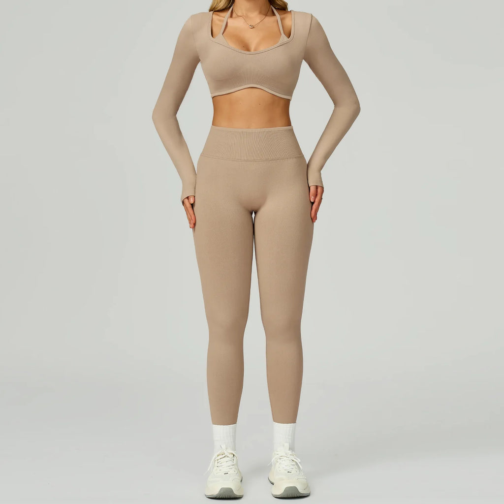 Xooie Fit women's activewear set featuring a long-sleeve crop top and high-waisted leggings in beige
