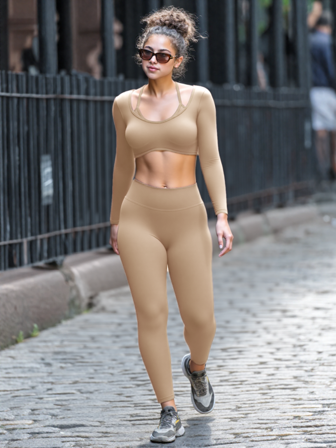 Xooie Fit women's activewear set featuring a crop top and high-waisted leggings in a neutral shade