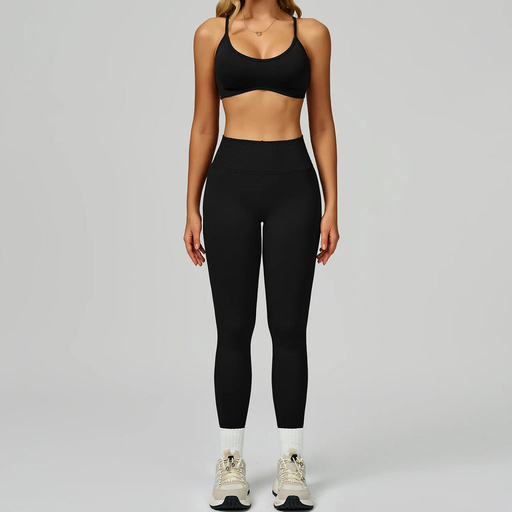 Xooie Fit women's activewear set featuring a black sports bra and high-waisted leggings for comfort during workouts
