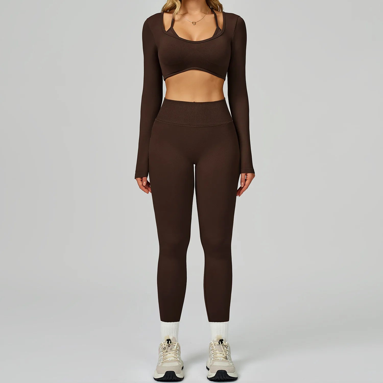 Xooie Fit women’s activewear set in brown featuring a long-sleeve top and matching leggings