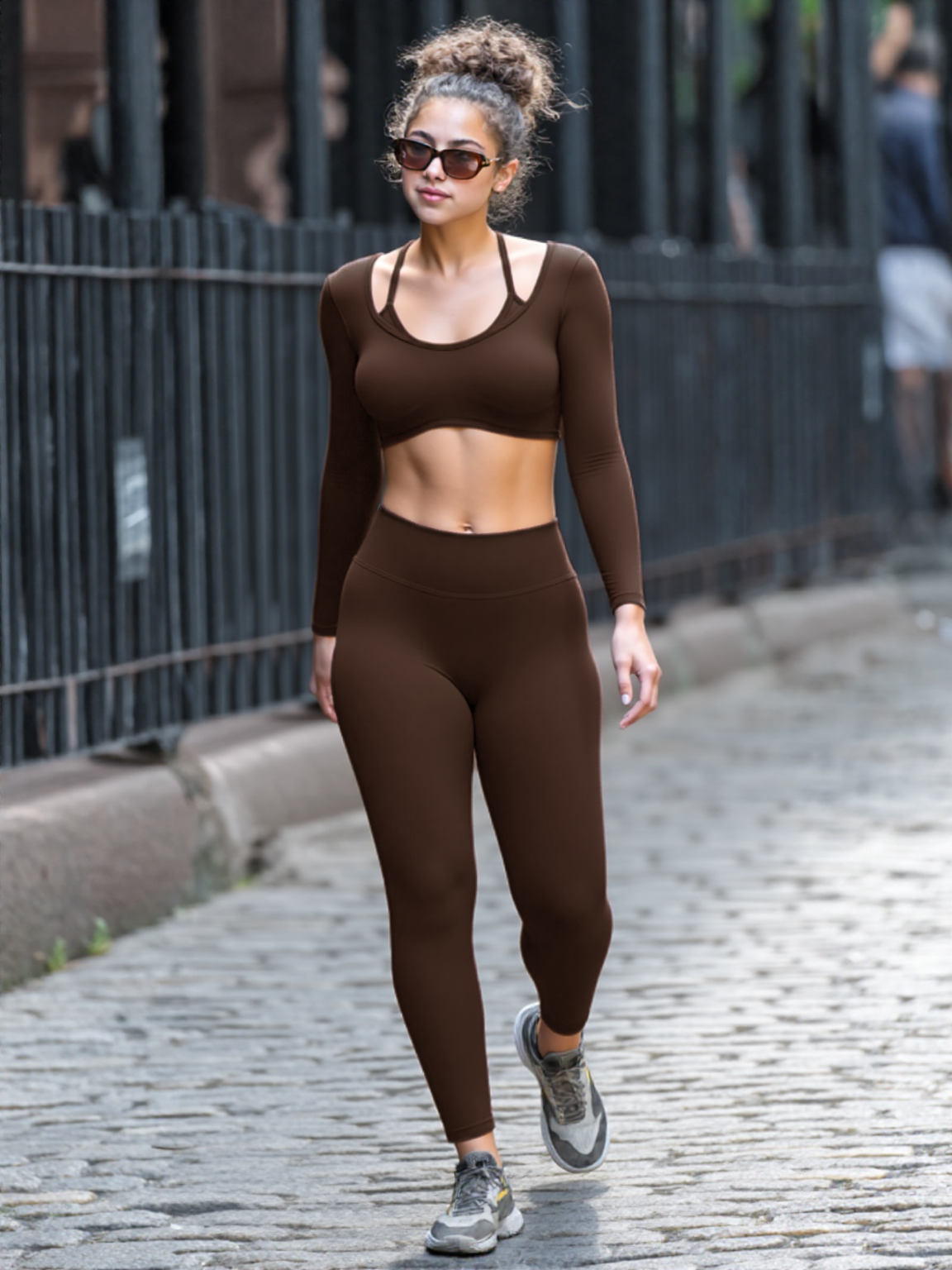 Xooie Fit women’s activewear set in brown, featuring a long-sleeve top and fitted leggings for workouts