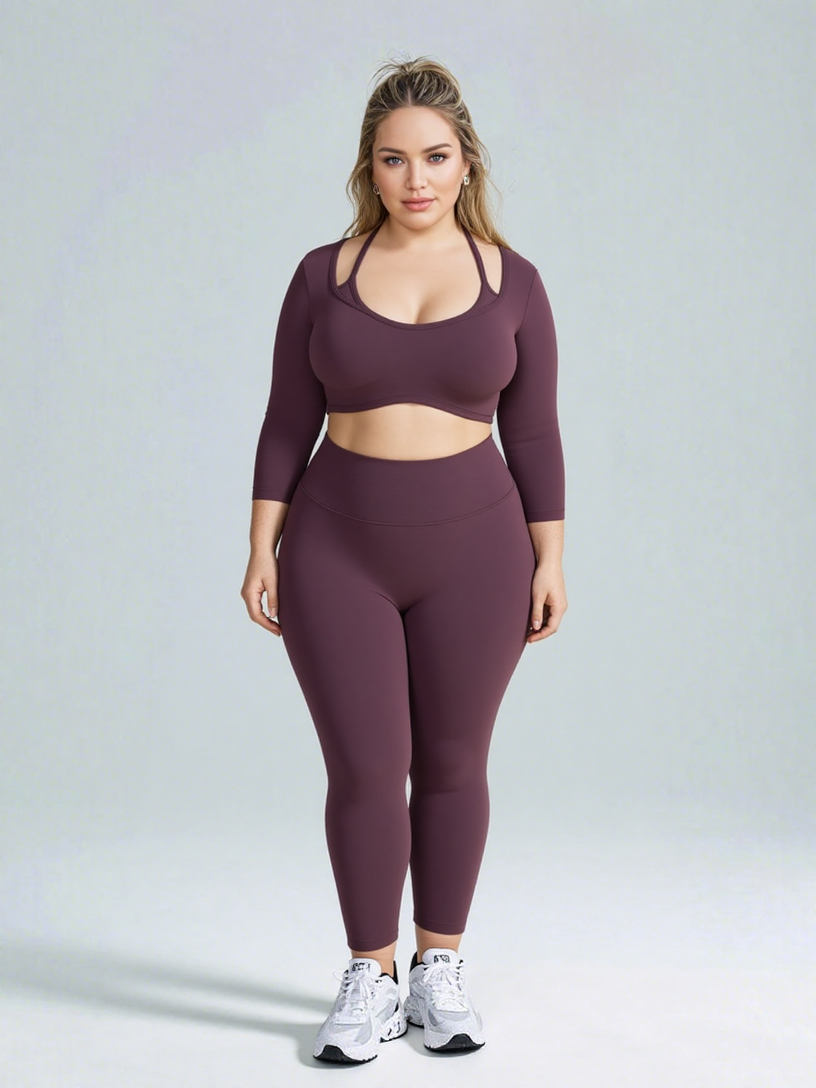 Women’s activewear set from Xooie Fit in burgundy, featuring a crop top and high-waisted leggings