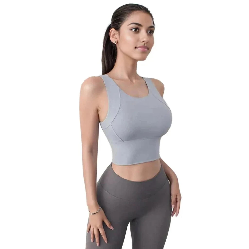 Xooie Fit women's activewear top in light gray with supportive fit for workout and leisure