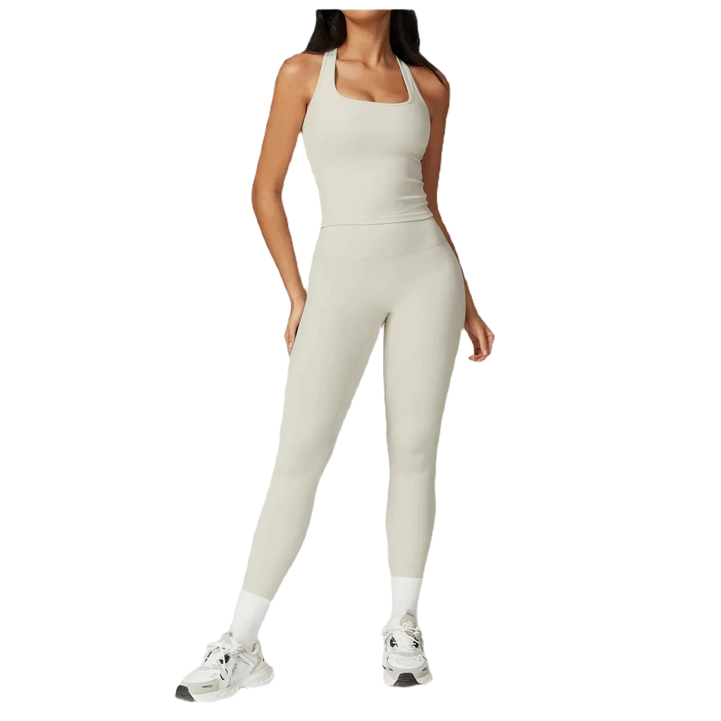 Light gray women's activewear top by Xooie Fit, designed for comfort and style in workouts