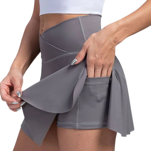 Xooie Fit women's athletic skort in grey with a flared design and convenient side pockets