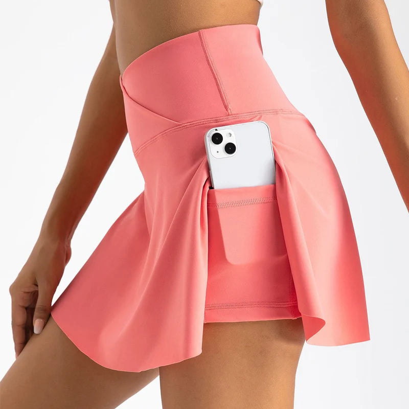 Xooie Fit Women's Athletic Skort in Coral with Side Pocket for Phone Storage