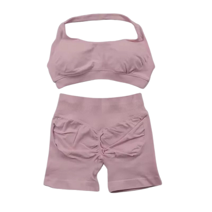 Pink women's fitness bra shorts set from Xooie Fit, ideal for workouts and activewear.
