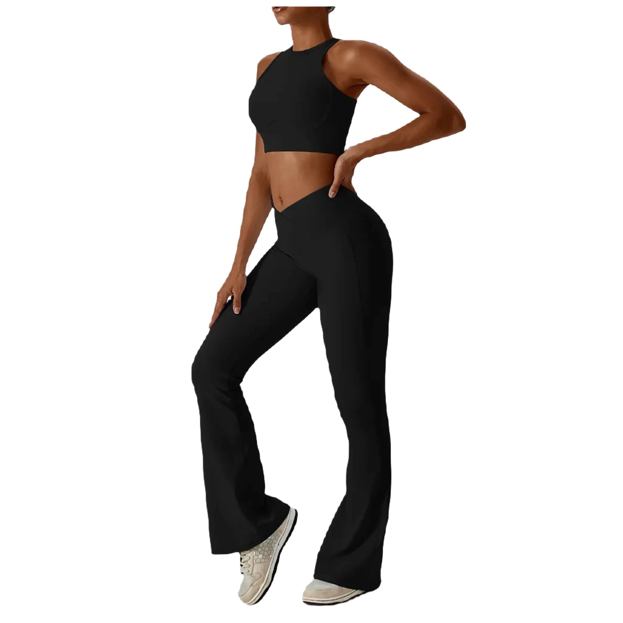 Black women's fitness bralette paired with high-waisted flared pants for activewear style