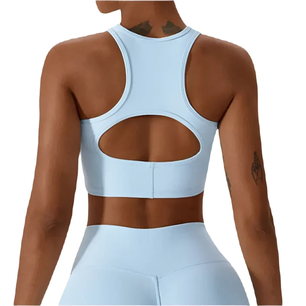 Light blue women's fitness bralette with a stylish cut-out design for comfort during workouts