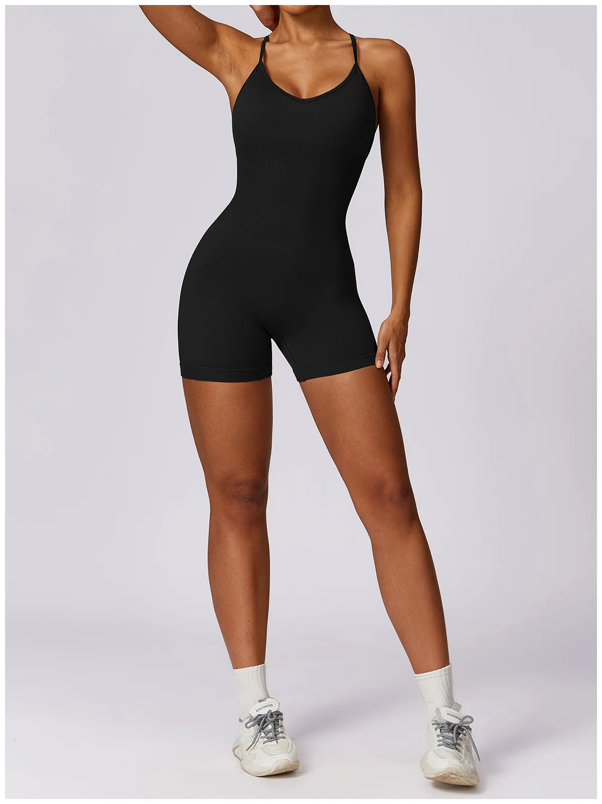 Xooie Fit women's fitness one-piece in black, ideal for workouts and casual wear