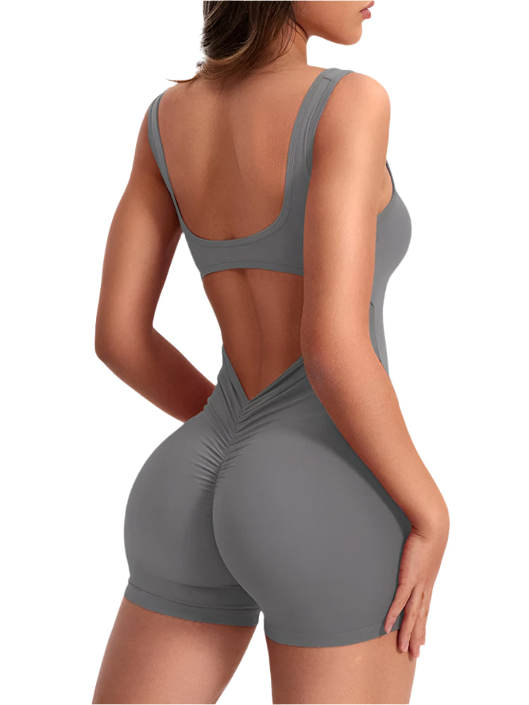 Stylish gray women's fitness romper with a flattering back design for comfortable workouts