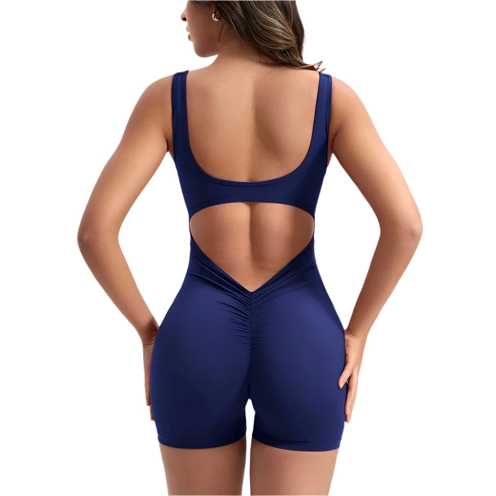 Navy women's fitness romper by Xooie Fit with a stylish back cutout design for active wear
