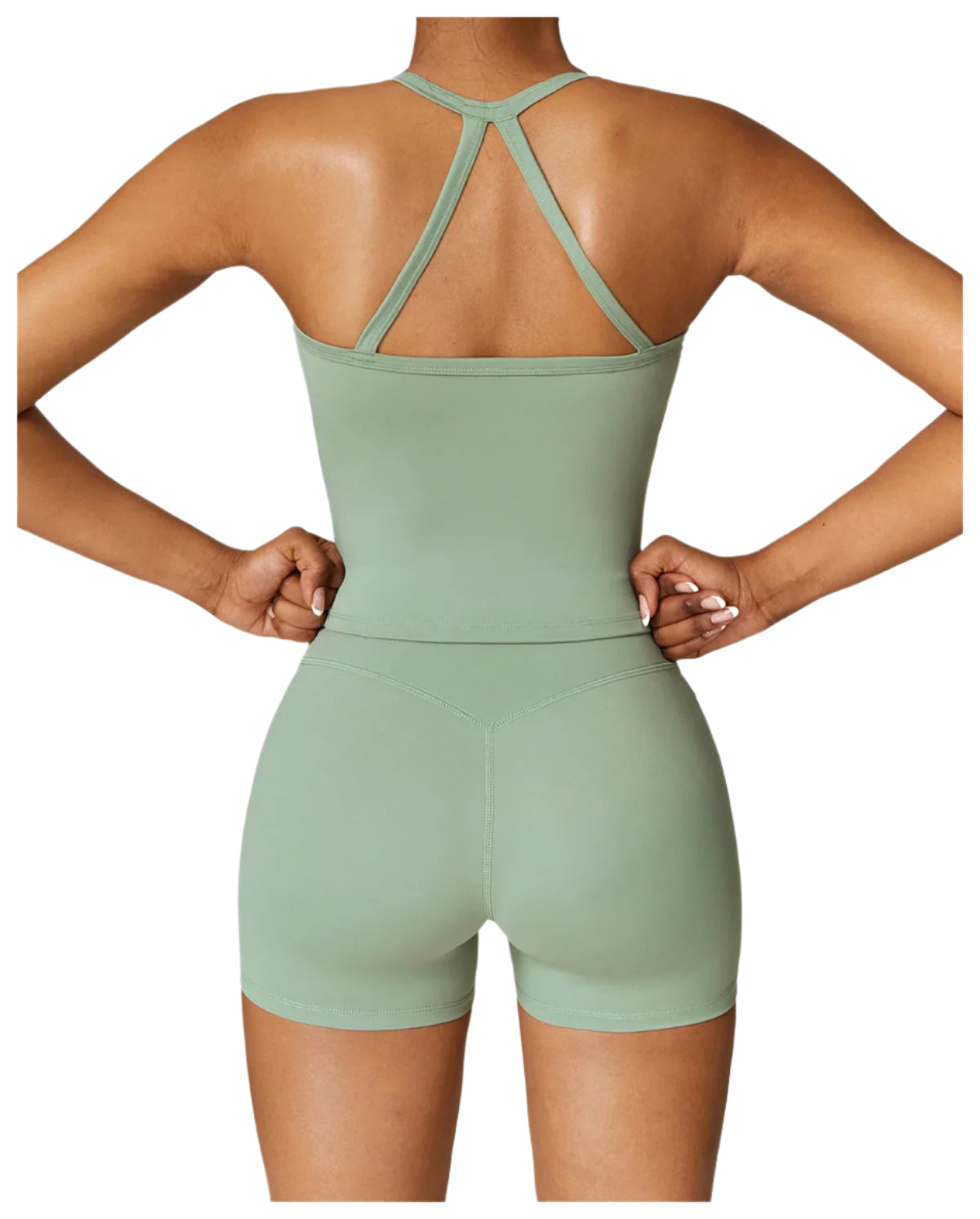 Xooie Fit women's fitness tank and shorts set in green, featuring a stylish cross-back design