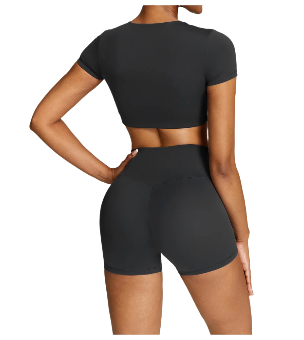 Stylish women's fitness two-piece set in black featuring a crop top and high-waisted shorts