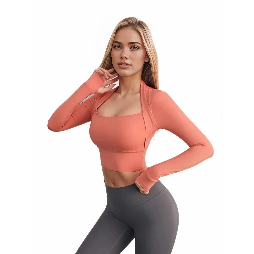 Xooie Fit women's fitted activewear top in coral color with long sleeves for comfortable workouts