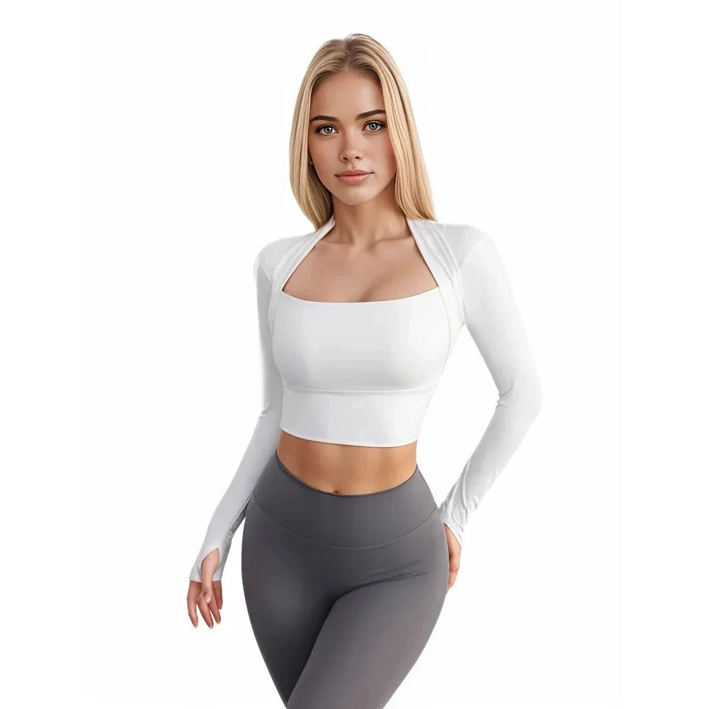 Stylish Xooie Fit women's fitted activewear top in white with long sleeves and a cropped design