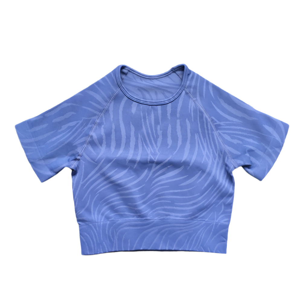 Xooie Fit women's fitted crop top leggings in blue with a stylish pattern for comfortable workouts