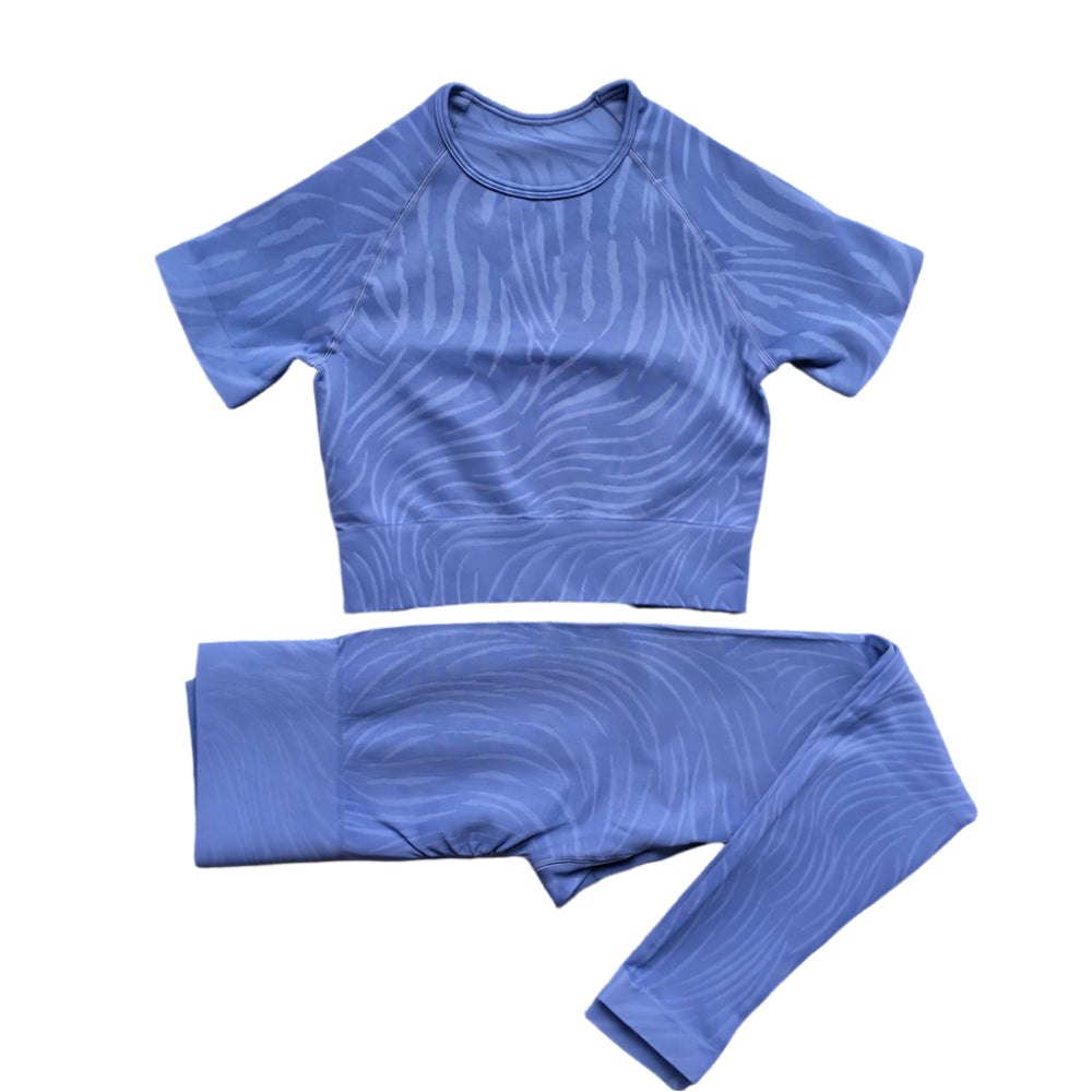 Xooie Fit women's fitted crop top leggings in soft blue with a stylish wave pattern for comfort and style