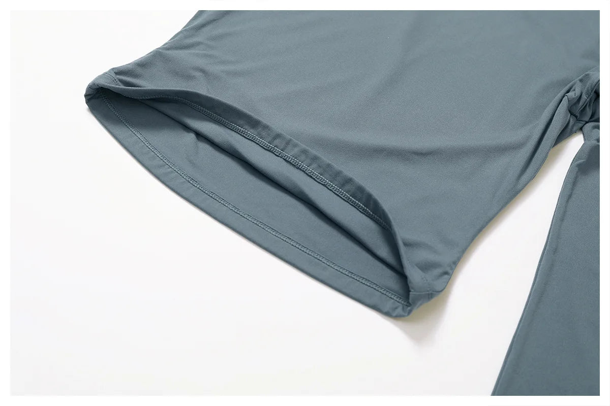 Xooie Fit women's fitted long-sleeve shirt featuring a sleek design and soft fabric for comfort
