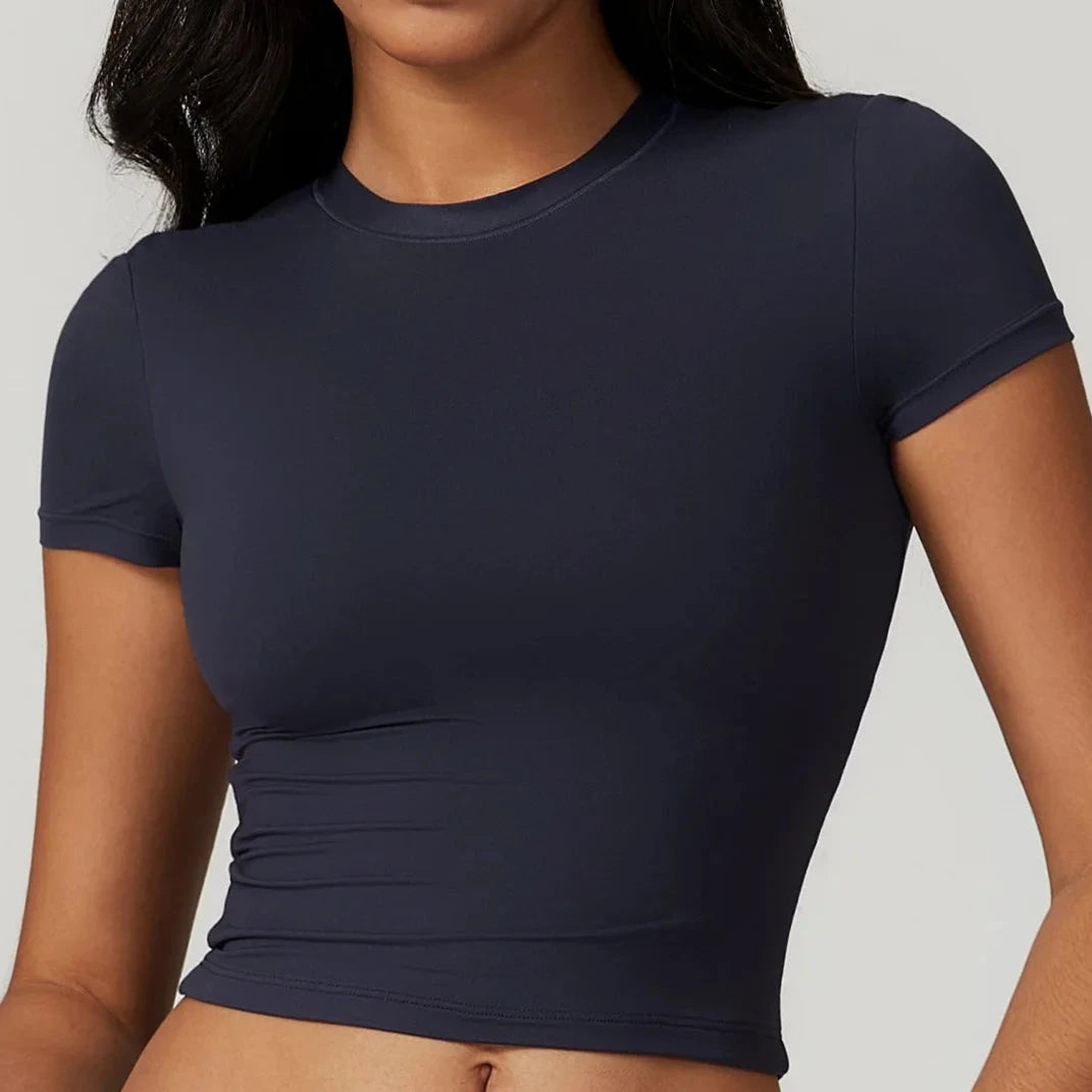 Xooie Fit women's fitted workout top in navy blue with short sleeves for active wear