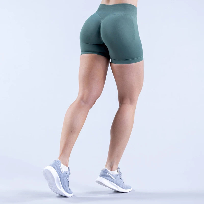Xooie Fit women's high intensity shorts in green, designed for comfort and performance during workouts