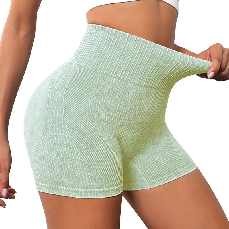 Xooie Fit women's high-waisted active shorts in mint green with textured design for comfort and flexibility
