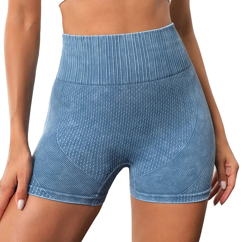 Xooie Fit women's high-waisted active shorts in blue with a stylish ribbed design for comfort and mobility