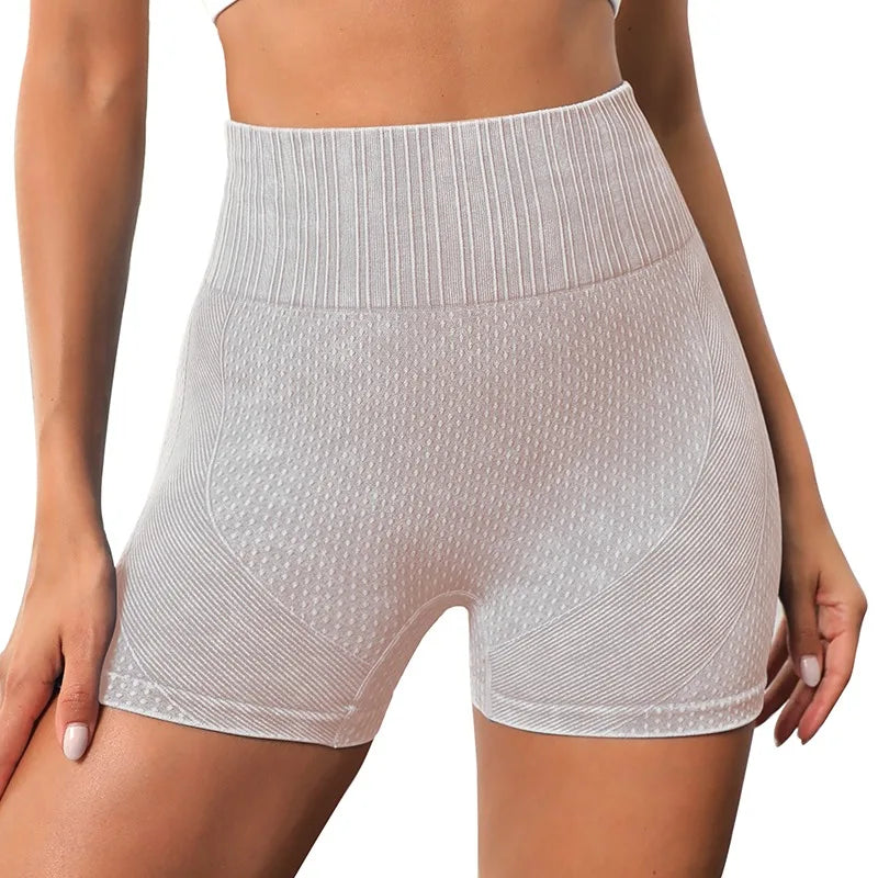 Xooie Fit women's high-waisted active shorts in light gray with a textured design for comfort and style