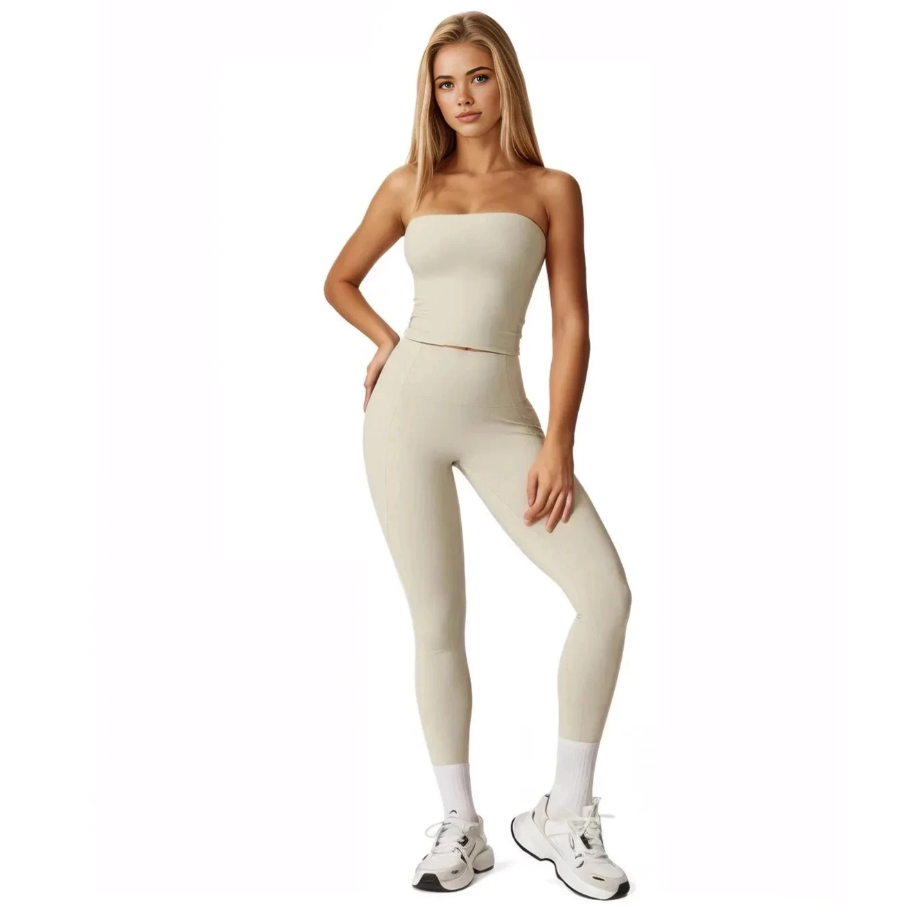 Stylish women's two-piece workout set in light beige with a strapless top and fitted leggings