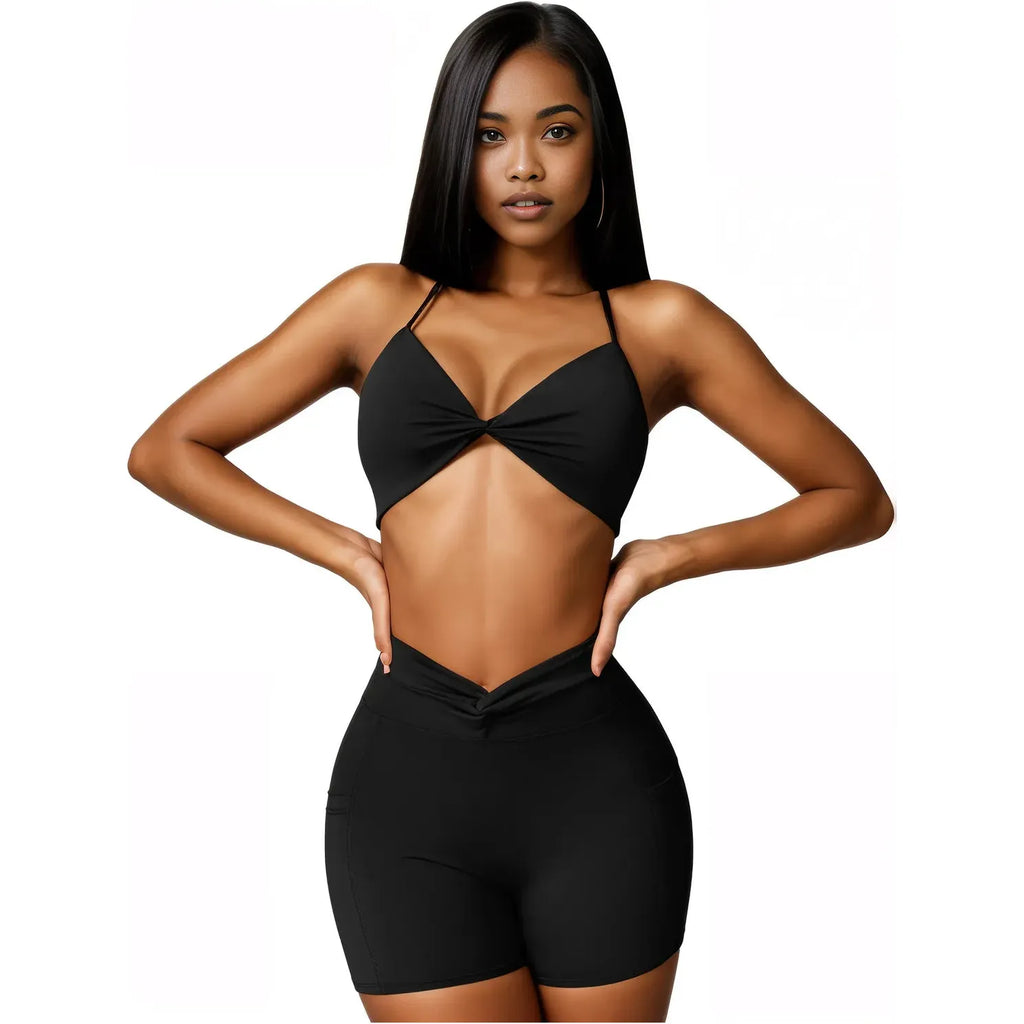 Xooie Fit women's two-piece workout set in black featuring a stylish crop top and shorts