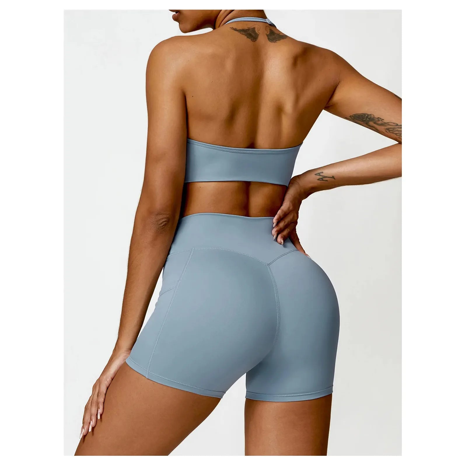 Xooie Fit women's two-piece workout set in blue with a supportive crop top and high-waisted shorts