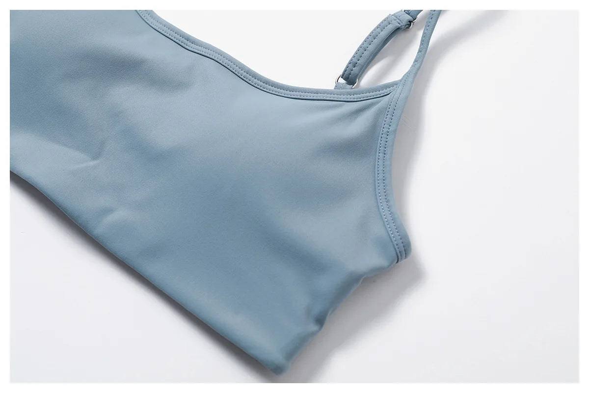 Xooie Fit women's two-piece workout set featuring a stylish light blue sports bra