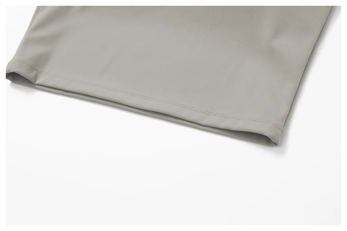 Close-up of the hem detail from Xooie Fit women's two-piece workout set in soft green color