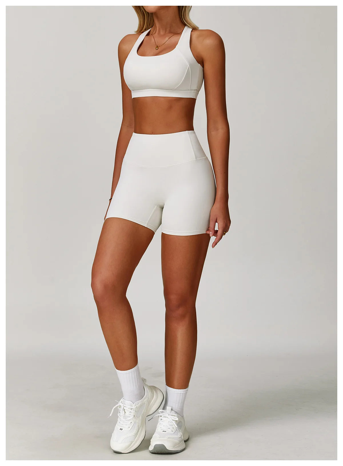 X-back sports bra and shorts set in white, designed for comfort and style during workouts