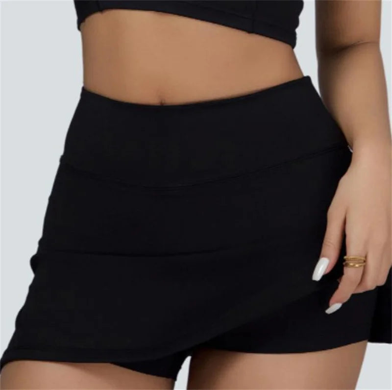 Xooie Fit black vest crop top and skort set featuring a fitted high-waist skort with matching crop top