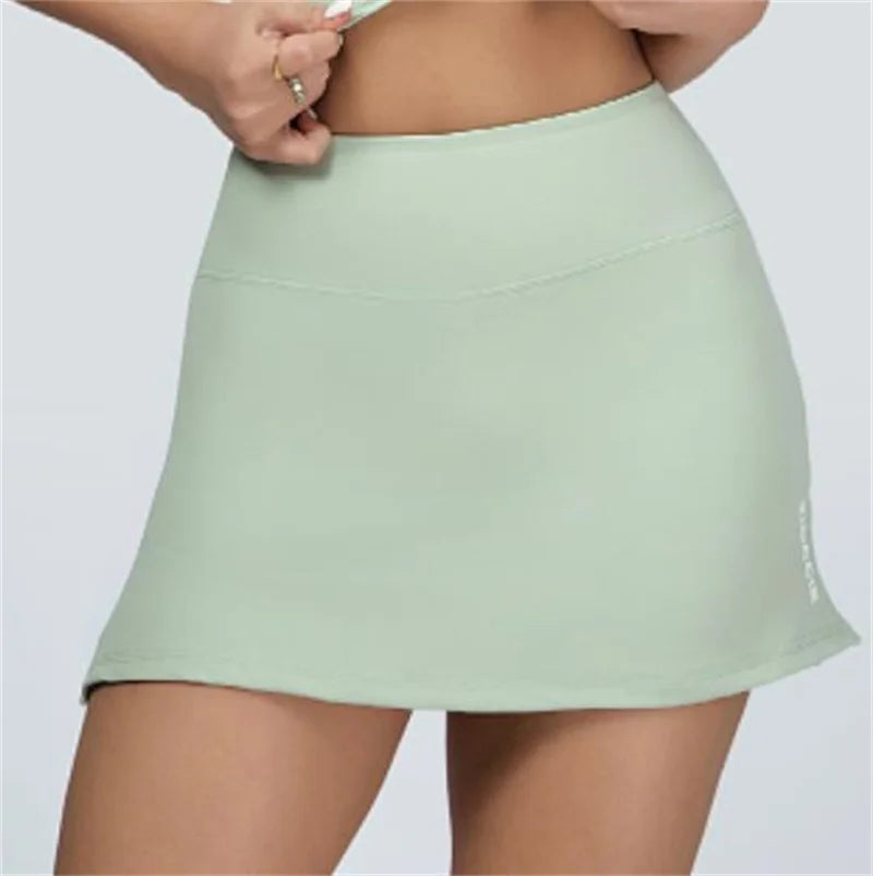 Xooie Fit light green vest crop top and skort set featuring a high-waist skort with comfortable fit