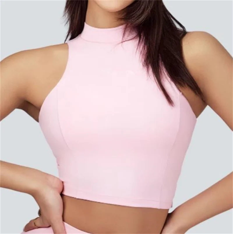 Xooie Fit light pink vest crop top and skort set with high neck and sleeveless design
