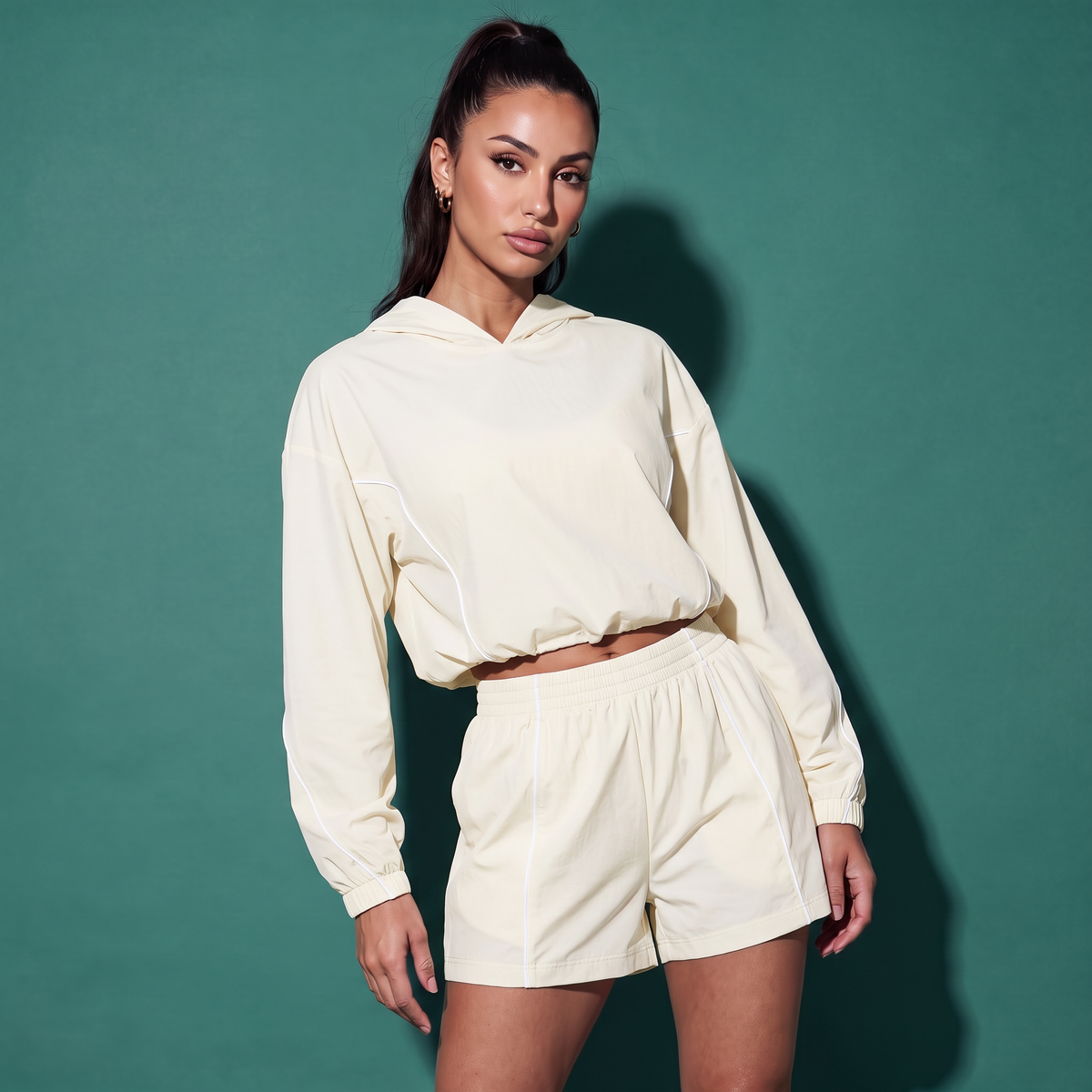 Off-white hooded sweatshirt and drawstring shorts set with white piping