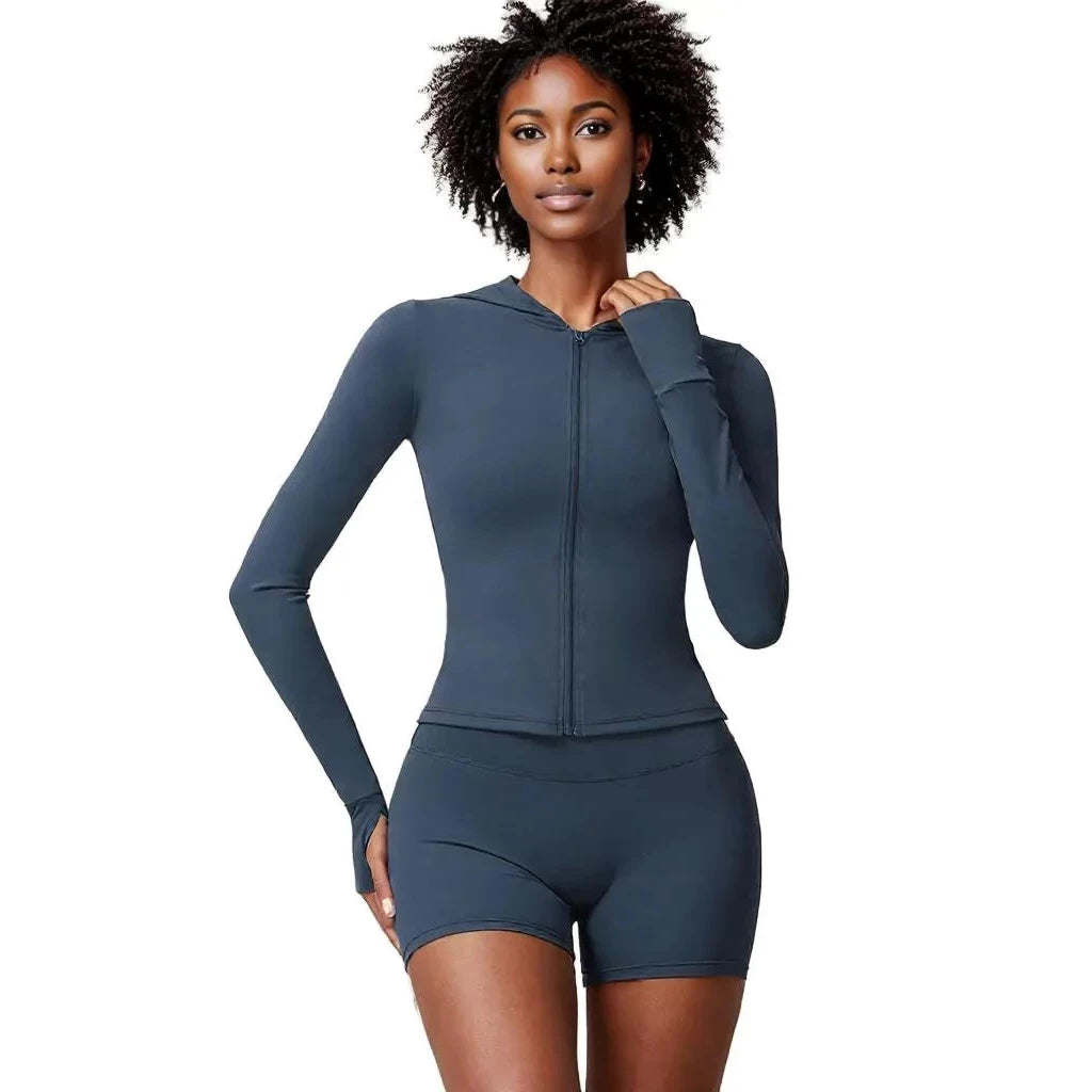 Xooie Fit women's athletic set in navy featuring a zip-up long sleeve top and matching shorts