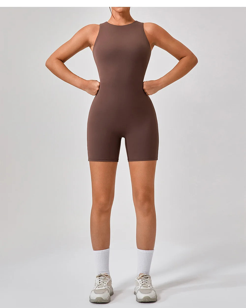 Hauncha brown active romper, sleeveless one-piece with fitted short legs.