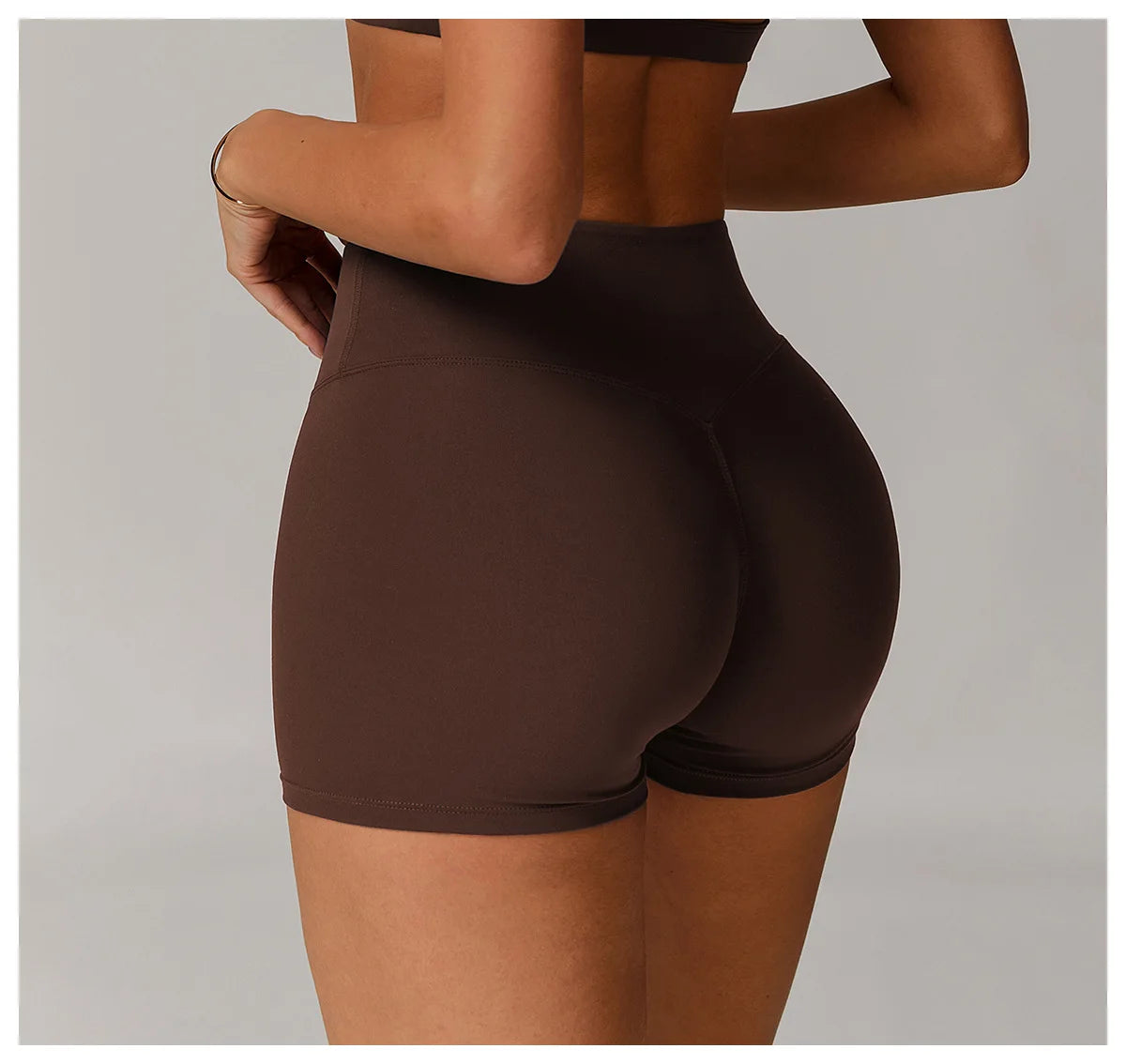 Xooie Fit brown women's active shorts with high waist and snug fit for workout comfort
