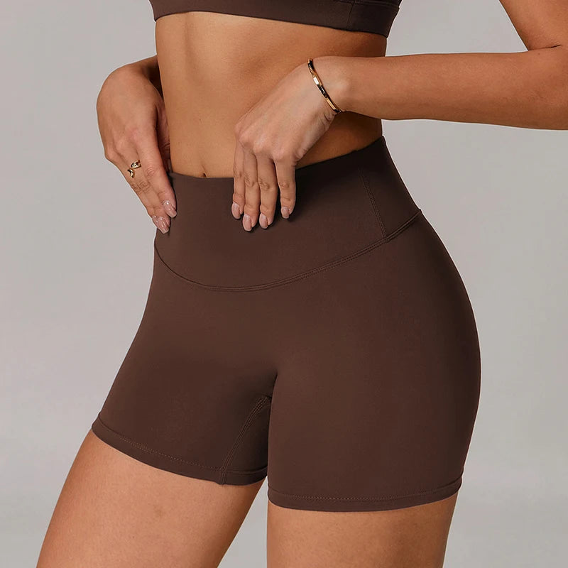 Xooie Fit women's active shorts in brown with high waistband and smooth fabric