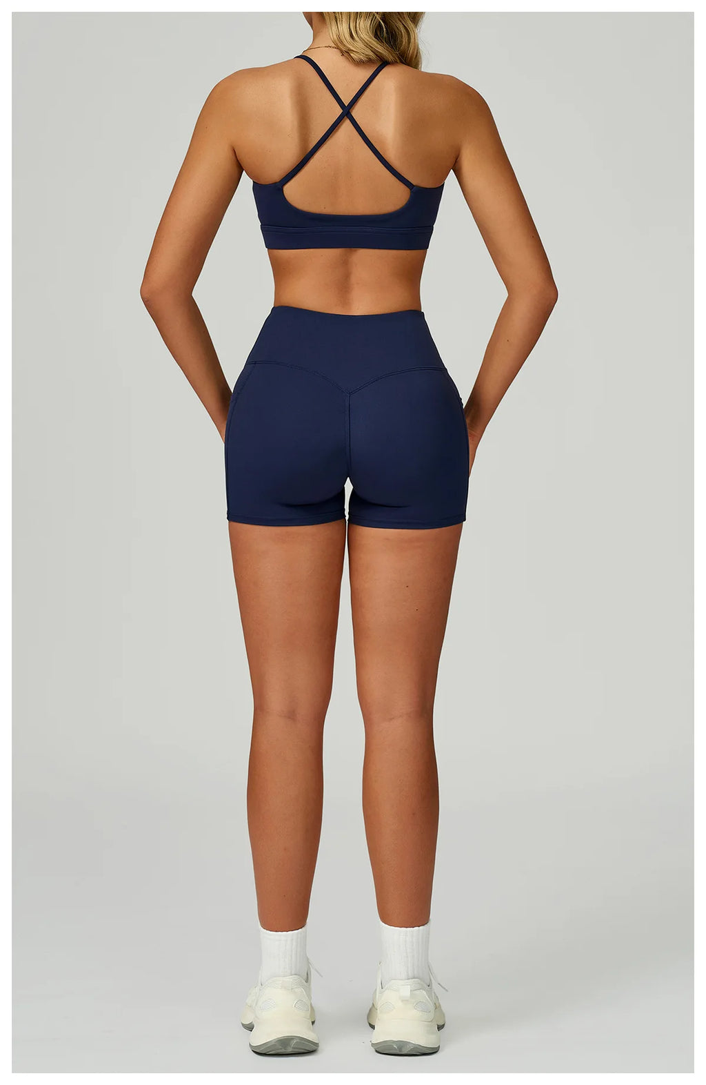 Back view of navy X-back bralette and matching shorts