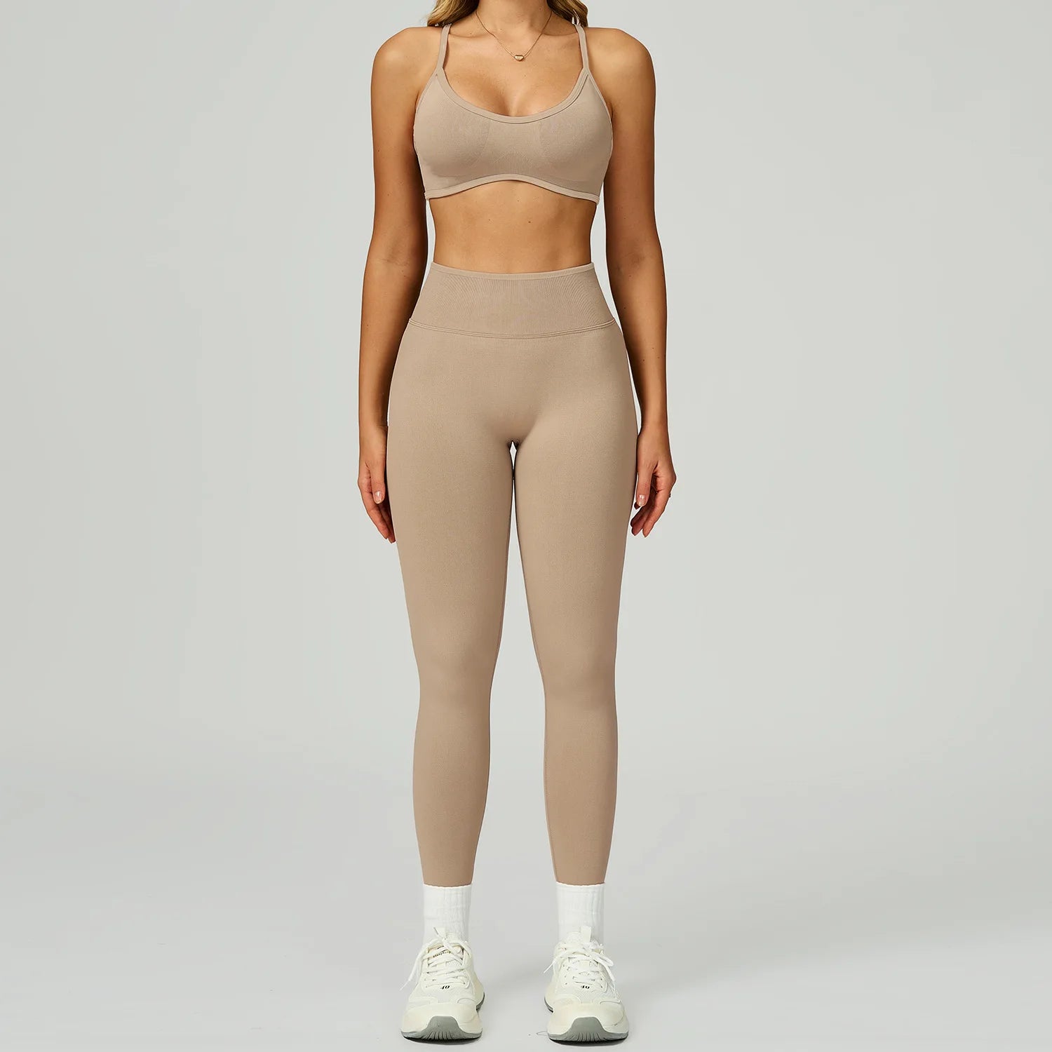 Xooie Fit women's activewear matching set in neutral tone with sports bra and high-waisted leggings